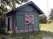 Budova starých dřevěných záchodů